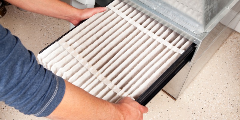 Hands Changing Furnace Air Filter Picture Id187874531