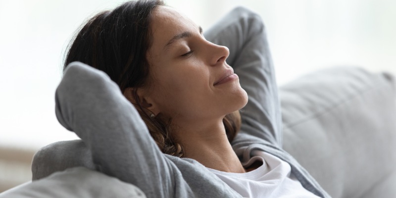 woman relaxing on couch