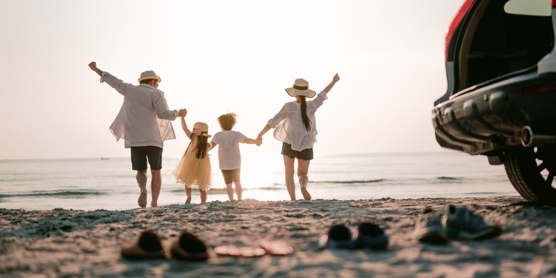 Family on the beach in Summer