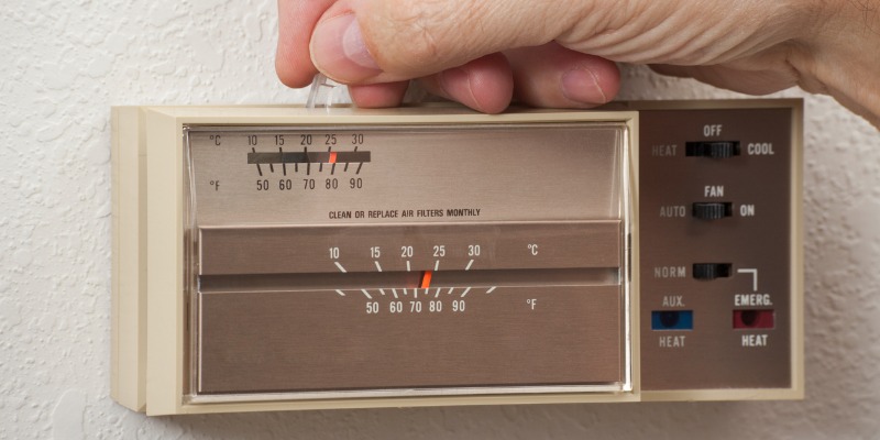 Mans Hand Adjusting Home Thermostat.jpg S=1024x1024&w=is&k=20&c=wnxin0bnde5a P 6glze297sotv1qfynywjufzxek8u= (1)