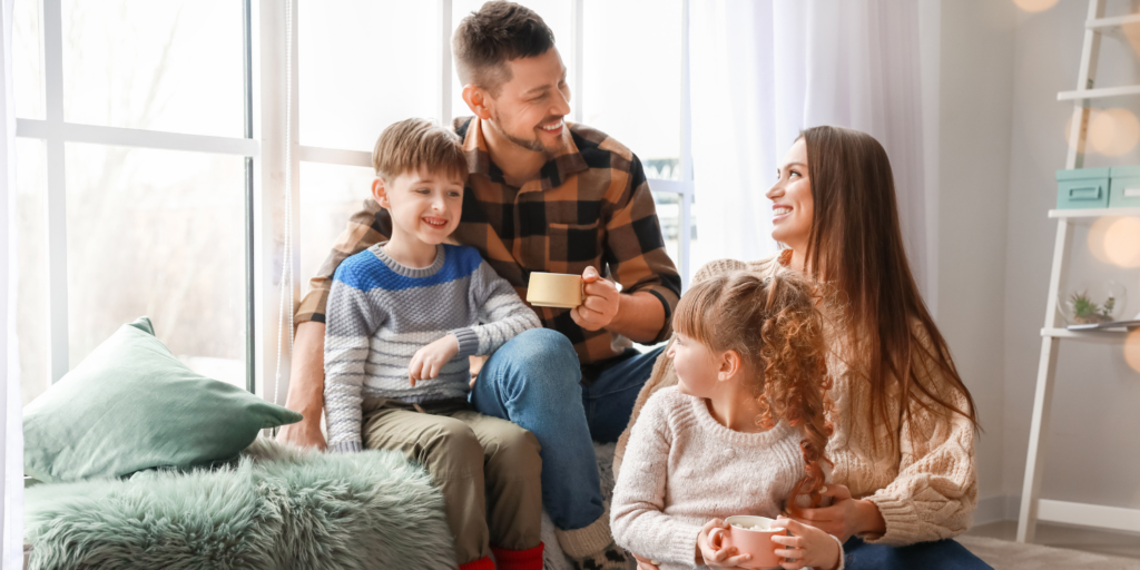 Family At Home In Winter - Hybrid Heat Pump Heating: Don’t Sacrifice Comfort for Efficiency